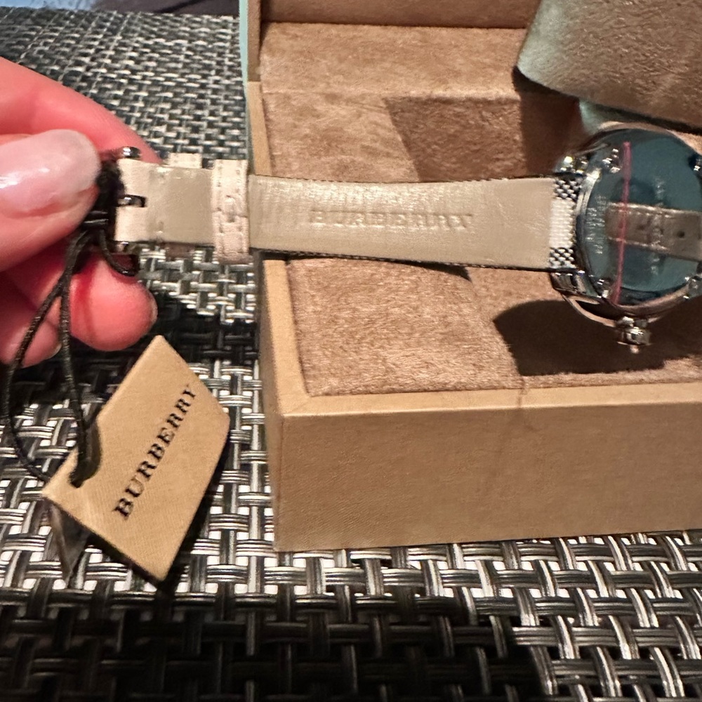 NWT BURBERRY LADY’S WATCH in black, red,light tan,cream and white. Round face. - Picture 7 of 13